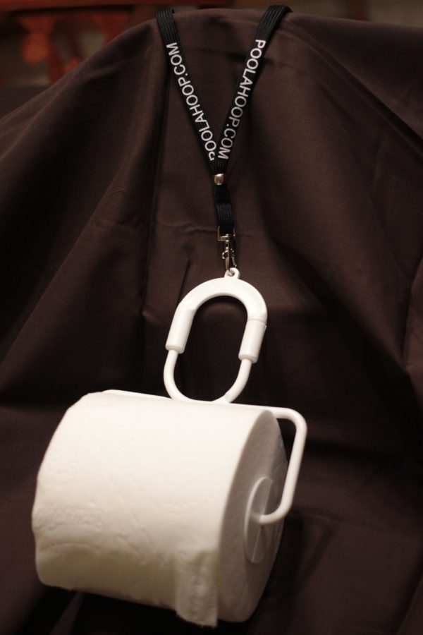 A Poo-lahoop™ tissue holder with lanyard.
